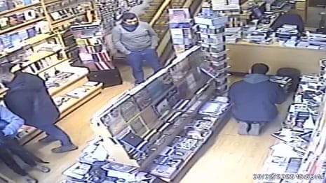 CCTV shows Israeli police raiding Jerusalem bookshop – video report