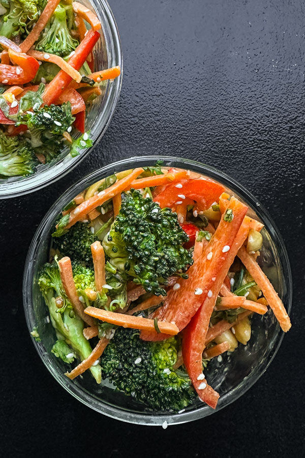 Thai Broccoli Salad – A crunchy, vibrant salad packed with bold flavors. Tossed with a zesty peanut dressing, this refreshing dish is perfect for meal prep, potlucks, or a light, nourishing meal. Find the recipe on Shutterbean.com #healthyrecipes #mealprep #saladlove #eattherainbow