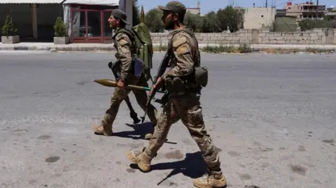 Reuters Syrian security forces in Suweida. Photo: 16 July 2025