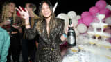 Lucy Guo attends her birthday party called 'Lucypalooza' in 2023, hosted by Le Bon Argent by Floyd Mayweather.