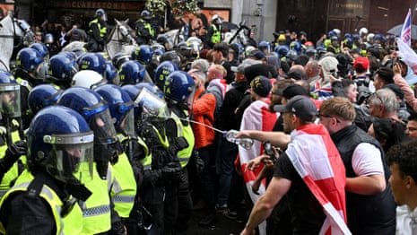 Protesters clash with police at far-right rally in London – video