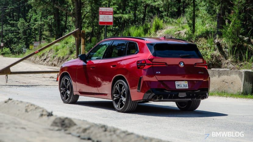 2025 BMW X3 M50 FIRE RED REVIEW 19 2025 BMW X3 M50 FIRE RED three quarter rear-end