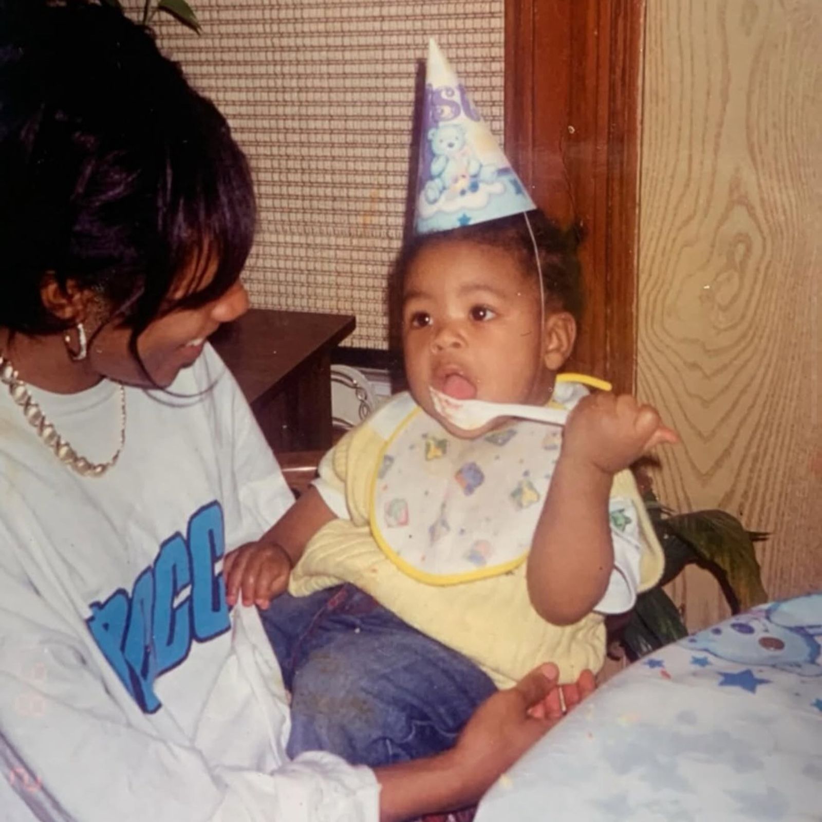 Image may contain Clothing Hat Face Head Person Photography Portrait Baby and People